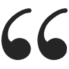 Two black quotation marks symbolizing testimonials or patient reviews for dental practice.